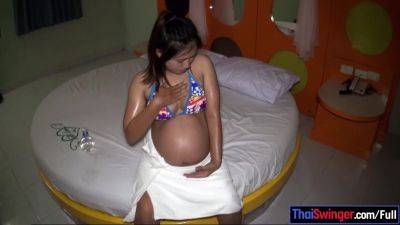 8 months pregnant Thai MILF amateur jerking off her husband - txxx.com - Thailand